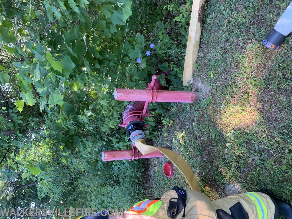 Flushing the dry hydrant on Dance Hall Rd 