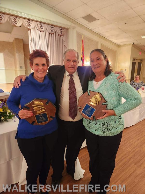 President Jim Graham presented Ellie Gilbert (L) and Jean Brooks (R) with the Member of the Year award.